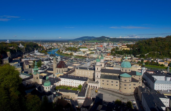 Salzburg cityscape with river and mountains
