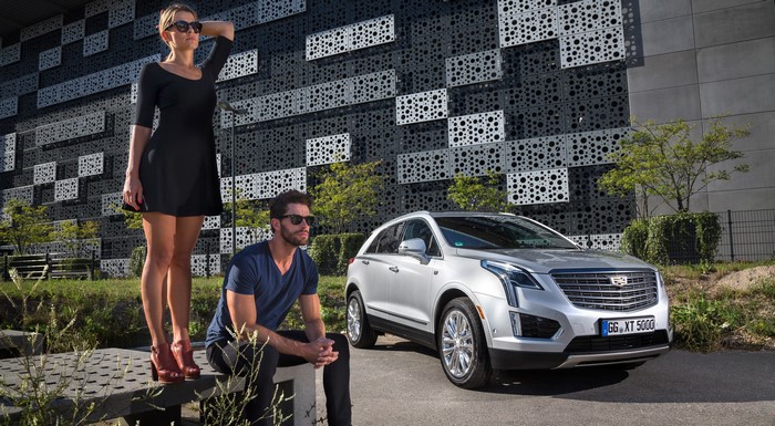 Cadillac XT5 Crossover with a couple