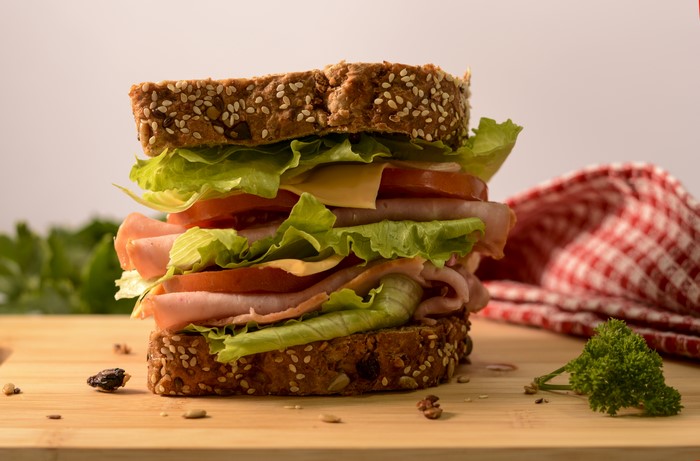 Ham and cheese sandwich with lettuce and tomato