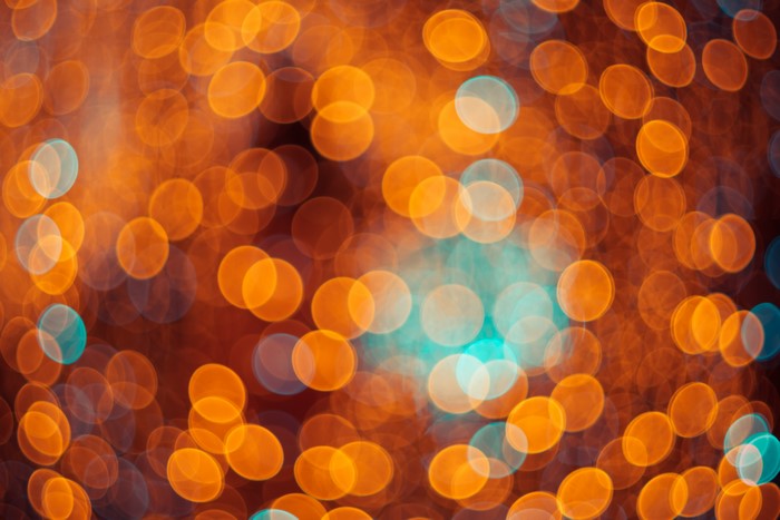 Orange and teal bokeh circles texture