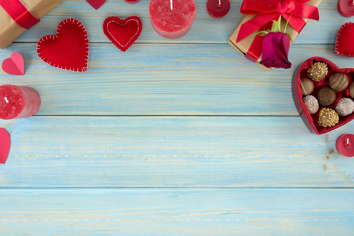 Valentine's Day Heart Candies and Gifts on Wood