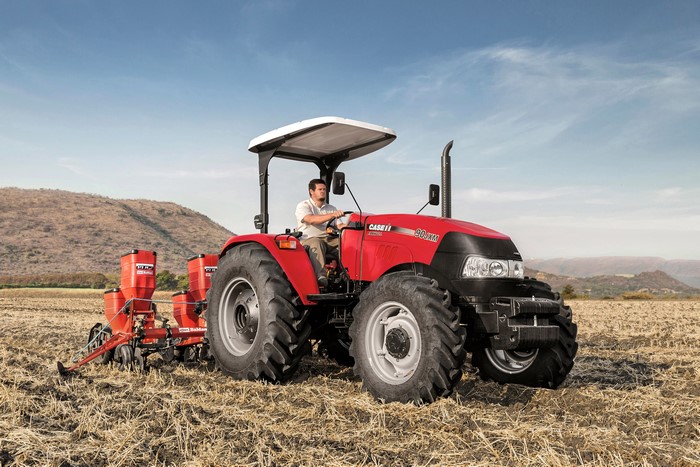 Case IH Farmall 90JXM tractor planting in a field
