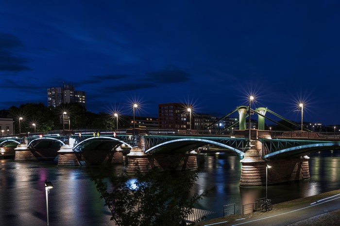 Frankfurt bridge over river at night