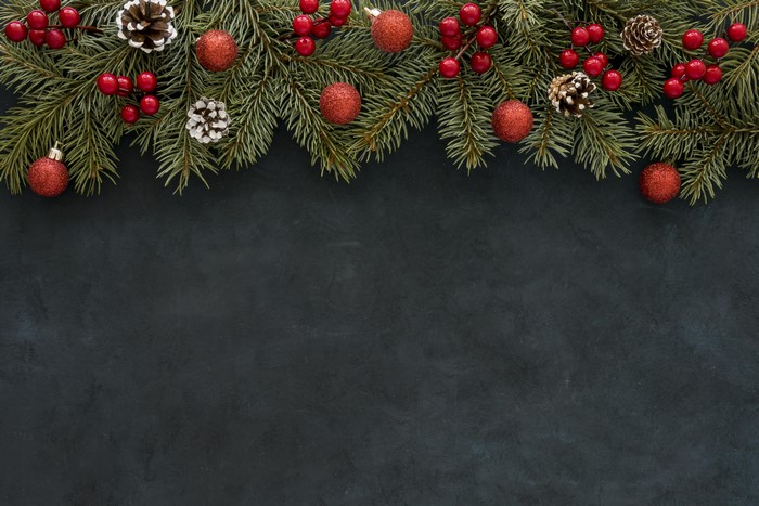 Christmas branches with ornaments and pine cones