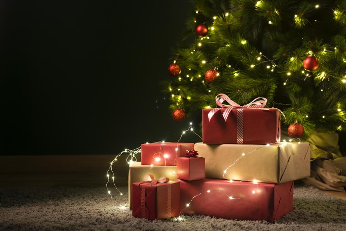 Christmas tree with gifts and fairy lights