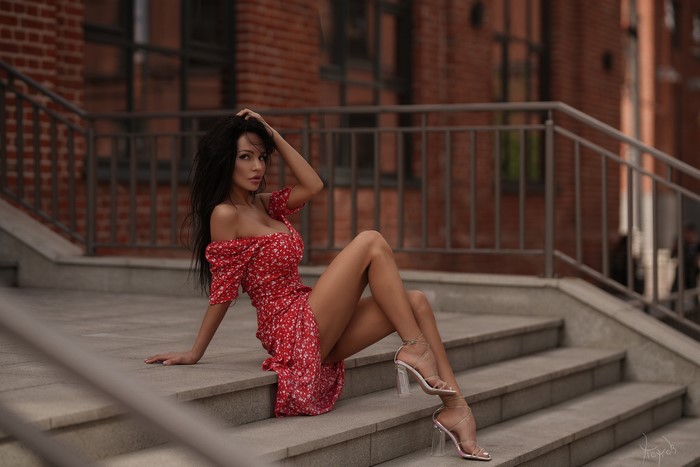 Lilya Volkova Sitting on Stairs by Andrey Popov