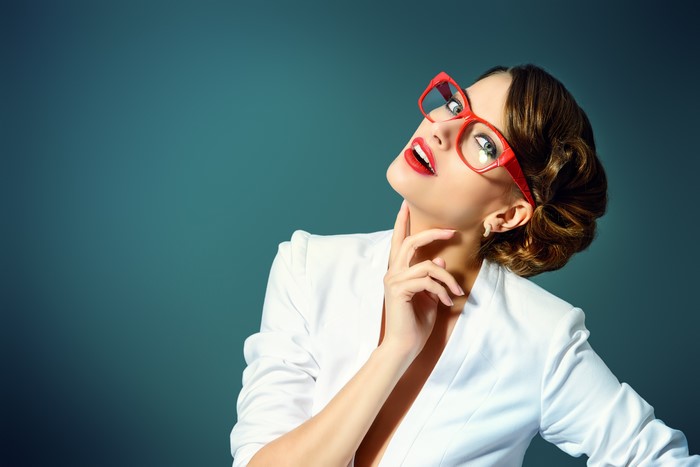 Woman with red glasses and red lips