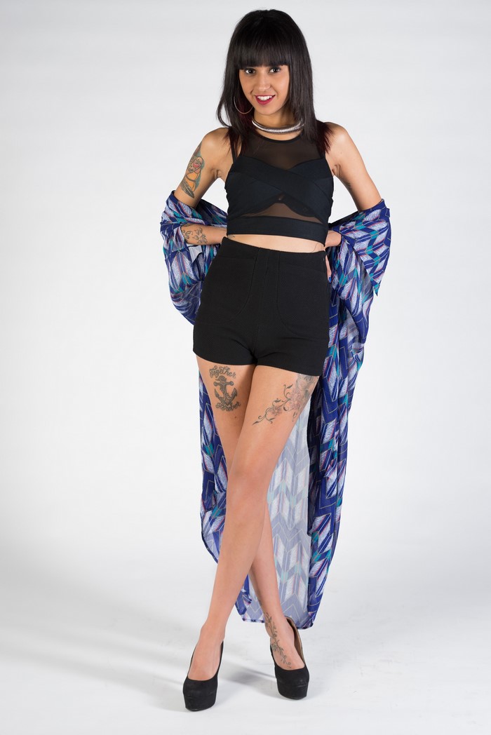 Nadia, Brunette girl posing with legs crossed
