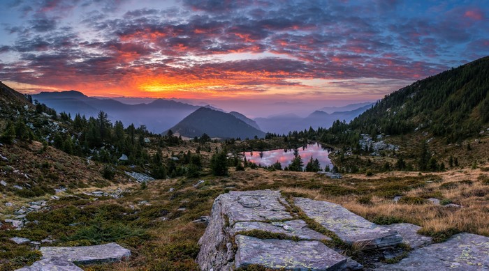 Sunset over a mountain lake in Ticino, Switzerland