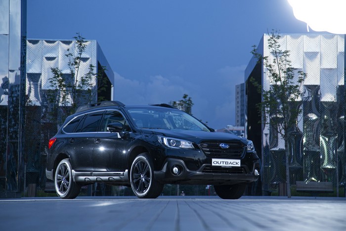 Black Subaru Outback Crossover parked outdoors