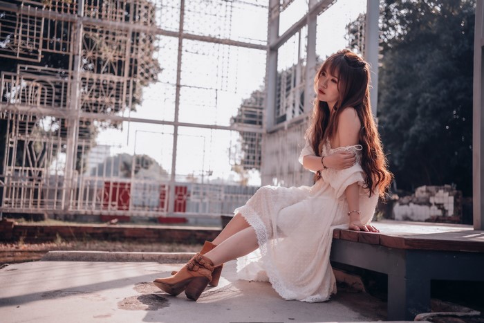 4K Asian Woman in White Dress Sitting
