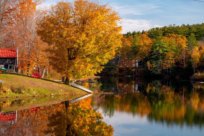 Autumn scene with a lake and trees in Vermont, USA