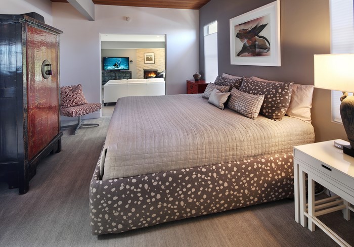 Bedroom with Asian cabinet and living room view
