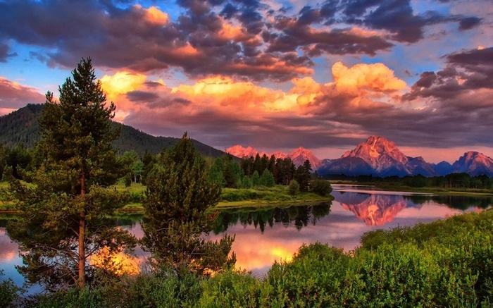 Sunset over mountains and river