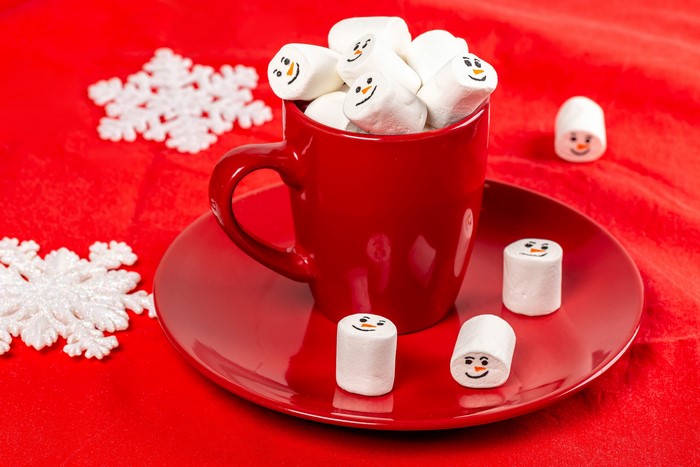 Christmas marshmallows in a red mug with snowflakes