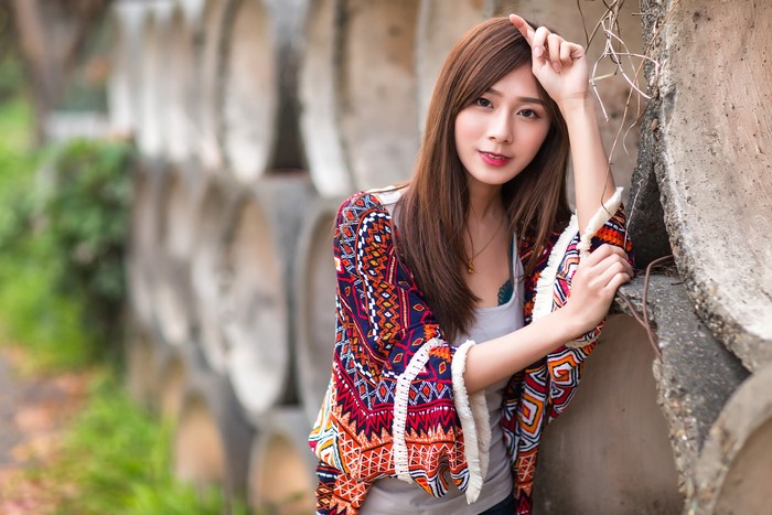 Asian woman with brown hair in colorful kimono