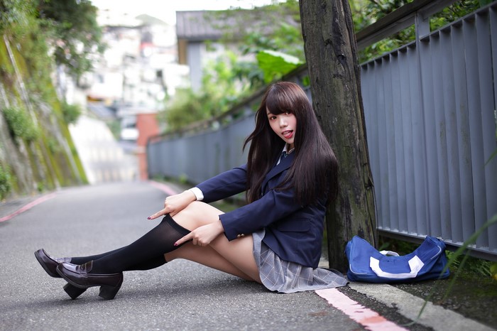 4K Brunette Asian Schoolgirl Sitting on Road