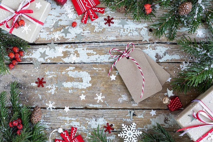 Christmas gifts and decorations on wood planks