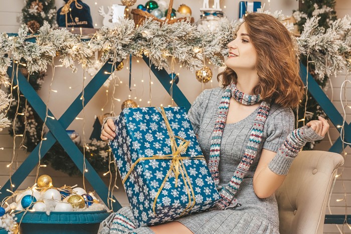 Woman with Christmas Gift