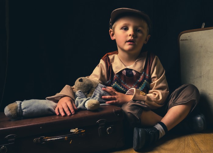 Boy with Toys and Suitcase