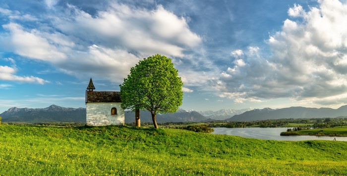Chapel and tree on a hill in Bavaria, Germany
