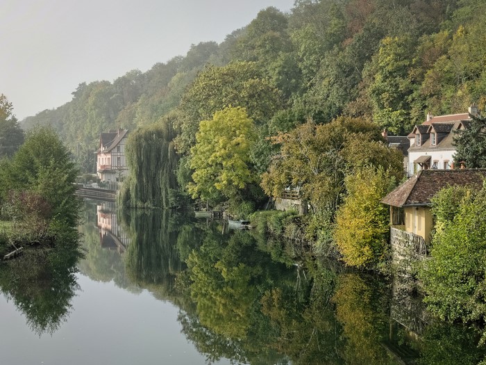 Houses on a riverbank in Montigny, France