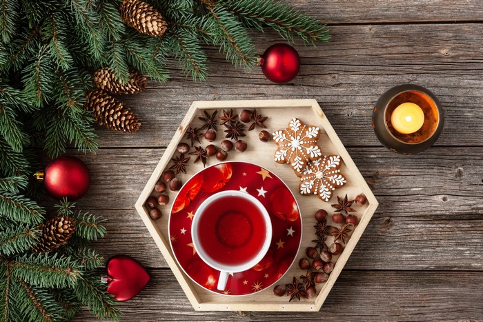 Christmas tea with cookies and pine cones