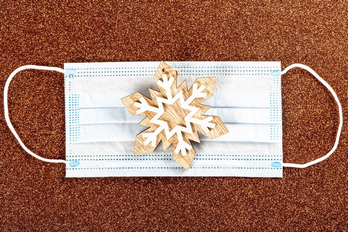 Christmas snowflake ornament on a face mask