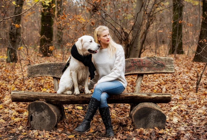 Laura and Dog on a Bench in Autumn