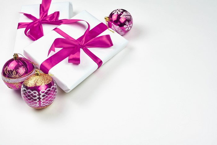 Christmas gifts and ornaments on a white background
