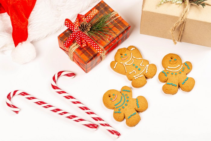 Christmas gifts, candy canes, and gingerbread cookies