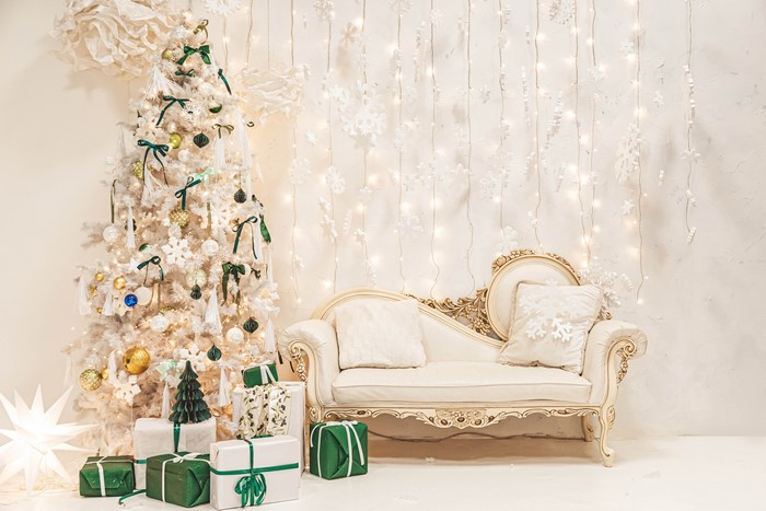 Christmas tree with gifts and sofa