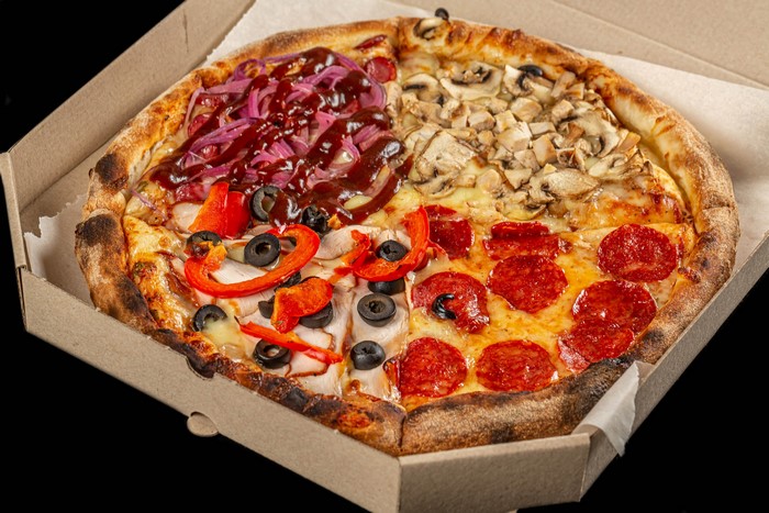 4-way pizza with pepperoni, mushrooms, chicken, and BBQ onions