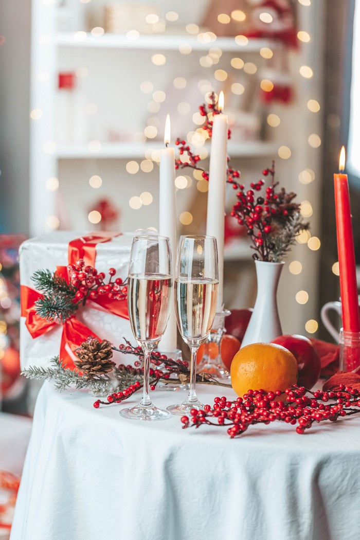 Christmas Table Setting with Champagne and Gifts