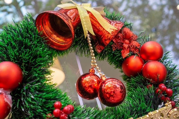 Christmas wreath with red bells and ornaments
