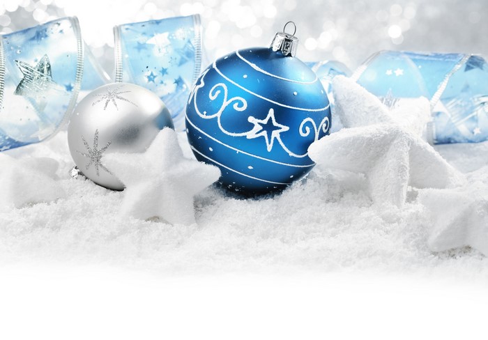 Christmas balls and star decorations in snow