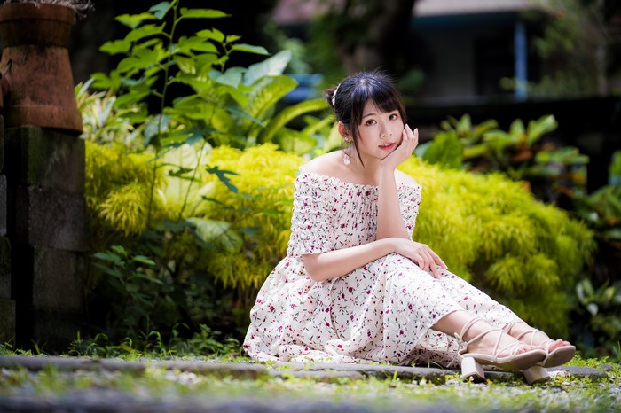 4K Asian Woman Sitting in Floral Dress