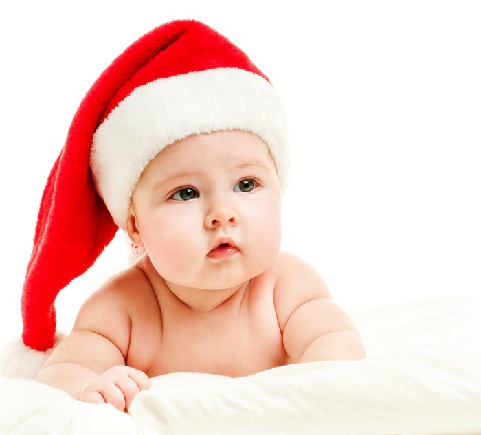 Baby wearing a Santa hat