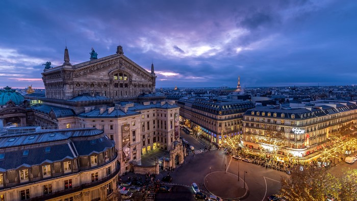 Paris Opera Garnier and cityscape at dusk