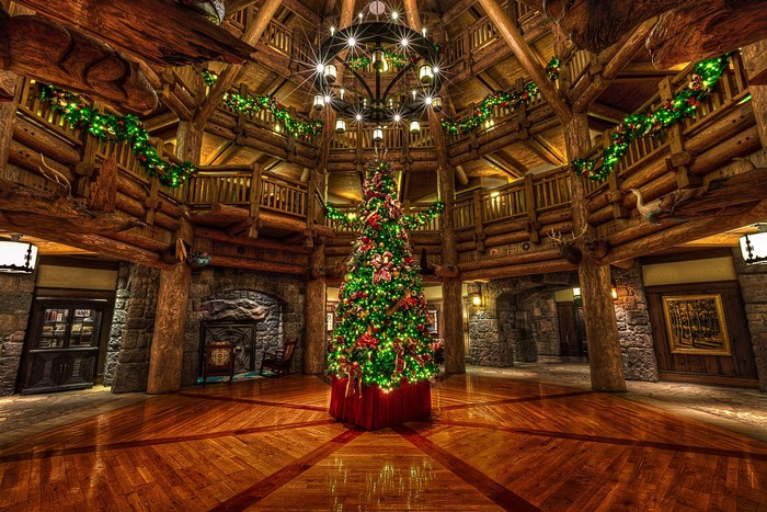 Christmas Tree and Chandelier in Log Cabin Interior