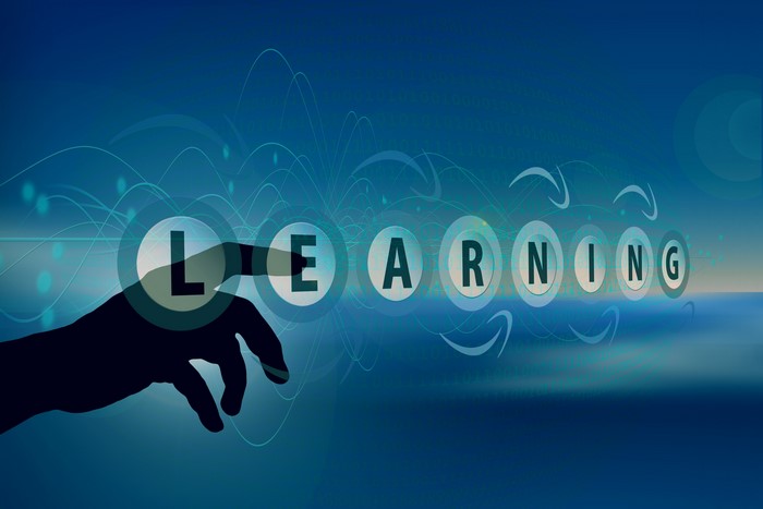Learning word with hand touching letters