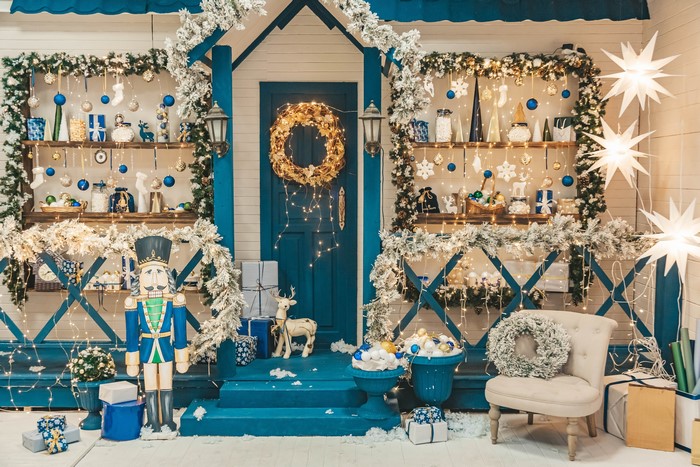 Christmas decorated porch with nutcracker and deer