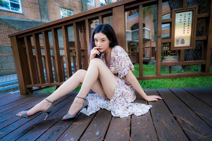 4K Asian Woman Sitting in Floral Dress