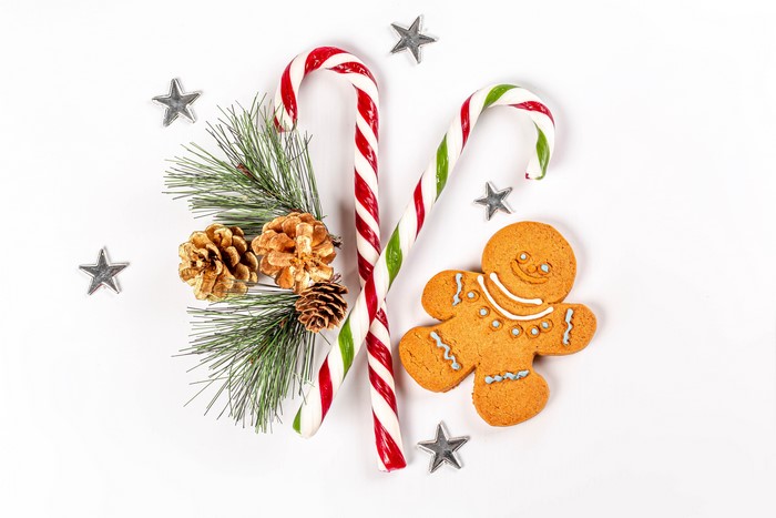 Christmas candy canes, gingerbread man, pine cones, and stars