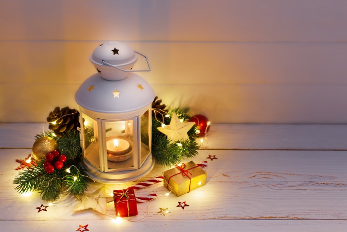 Christmas lantern with candle and decorations
