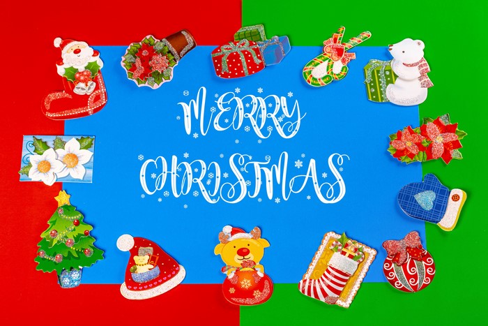 Merry Christmas decorations with Santa, reindeer, and gifts