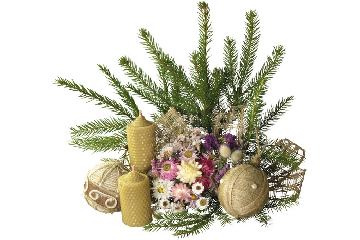 Christmas arrangement with candles and fir branches