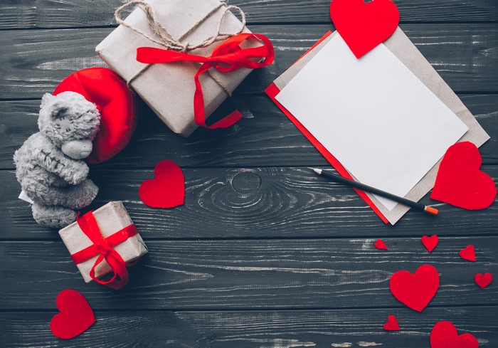 Valentine's Day gifts and greeting card on wood