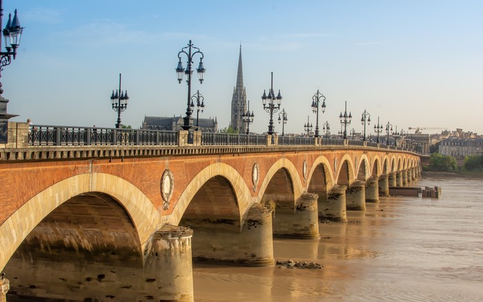 Pont de Pierre Bridge over Garonne River in Bordeaux, France