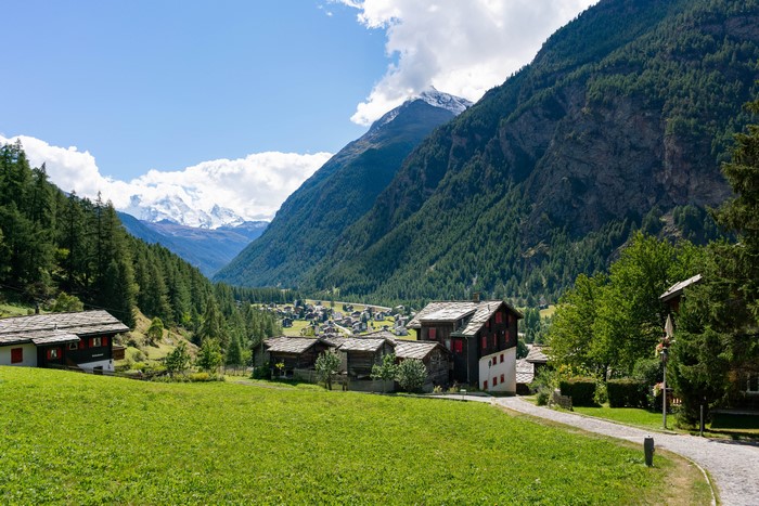 Village of Randa, Switzerland, with Mountains and Forests